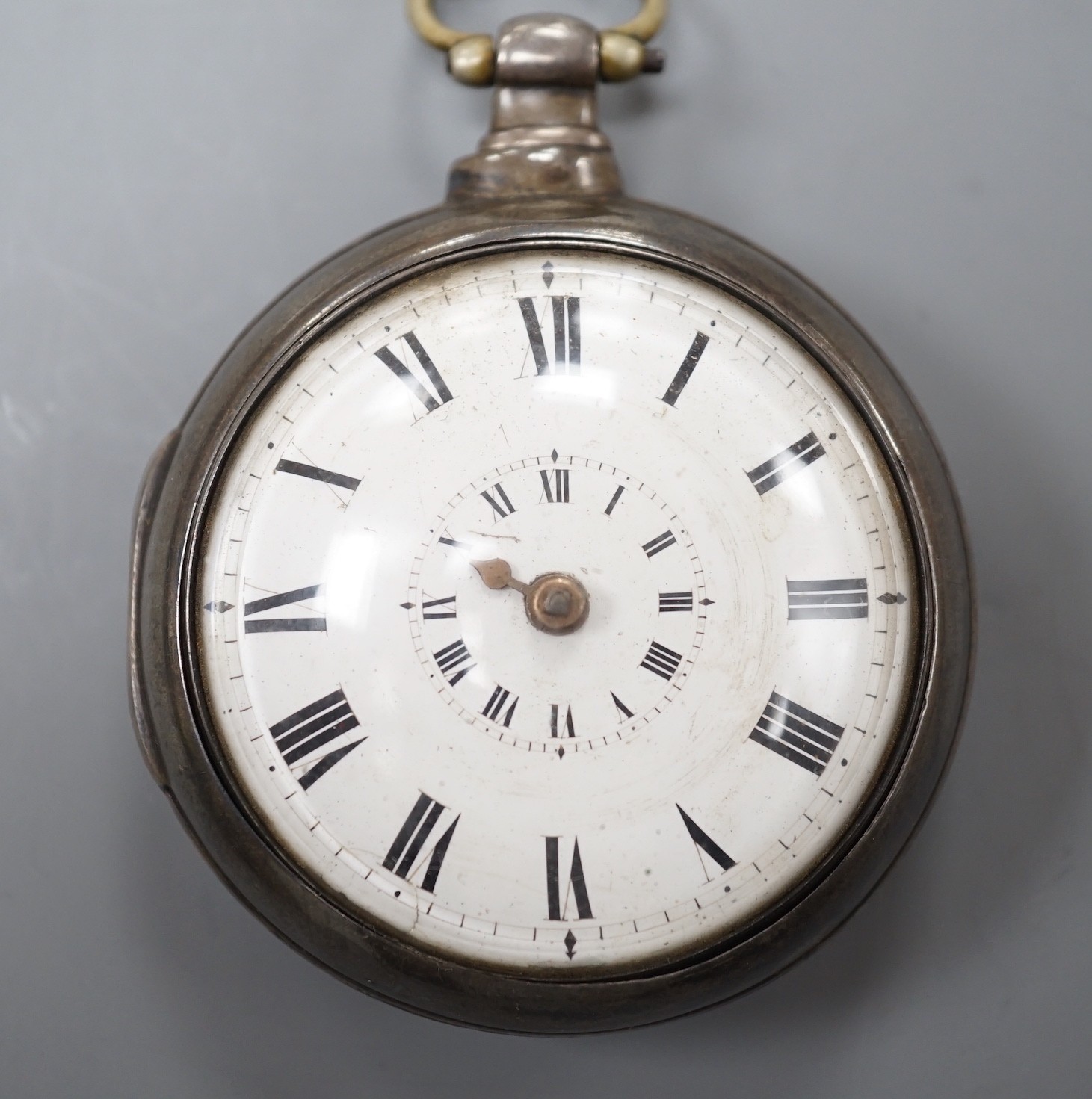 A George IV silver pair cased keywind verge pocket watch, by Thomas Phillips of Ludlow, with two Roman dials, case diameter 56mm.